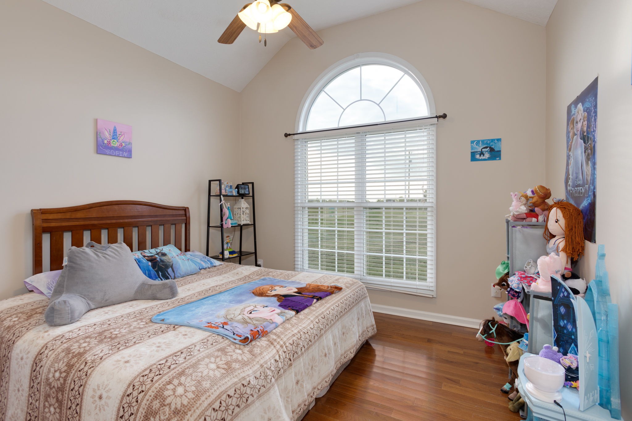 621 Jackson Road Portland, TN 37148 - Photo 17 of 32 a bedroom with bed and a large window