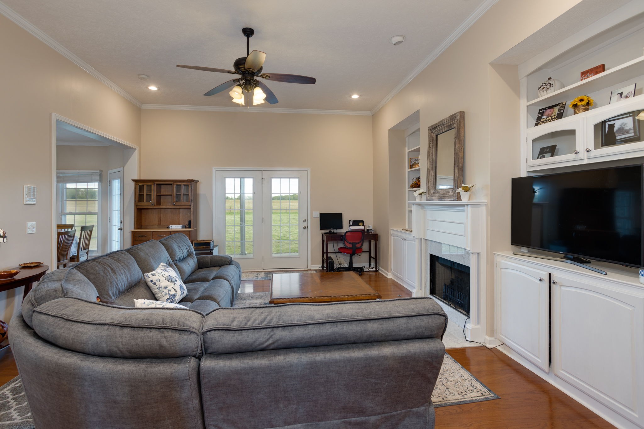 621 Jackson Road Portland, TN 37148 - Photo 7 of 32 a living room with furniture fireplace and flat screen tv