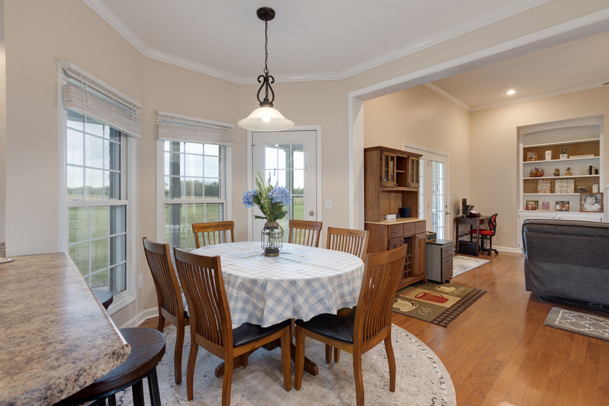 621 Jackson Road Portland, TN 37148 - Photo 8 of 32 a view of a dining room with furniture window and wooden floor