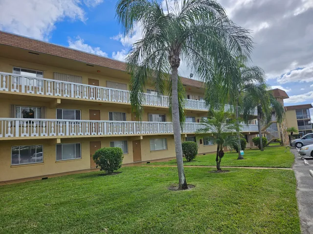 a view of a house with a swimming pool