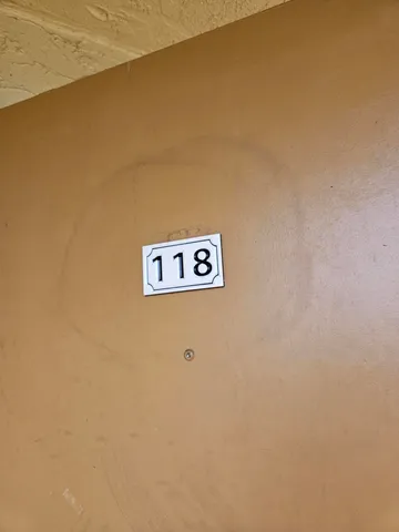 a wall with a sign on it
