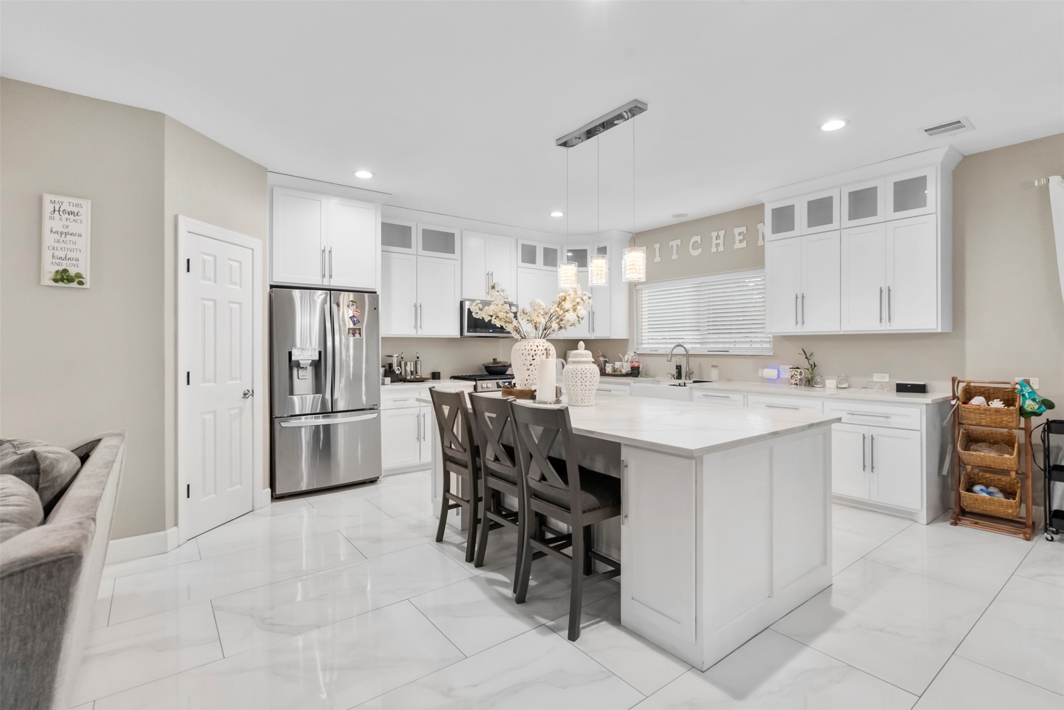 21502 Flint Trail Porter, TX 77365 - Photo 15 of 38 a kitchen with refrigerator and cabinets