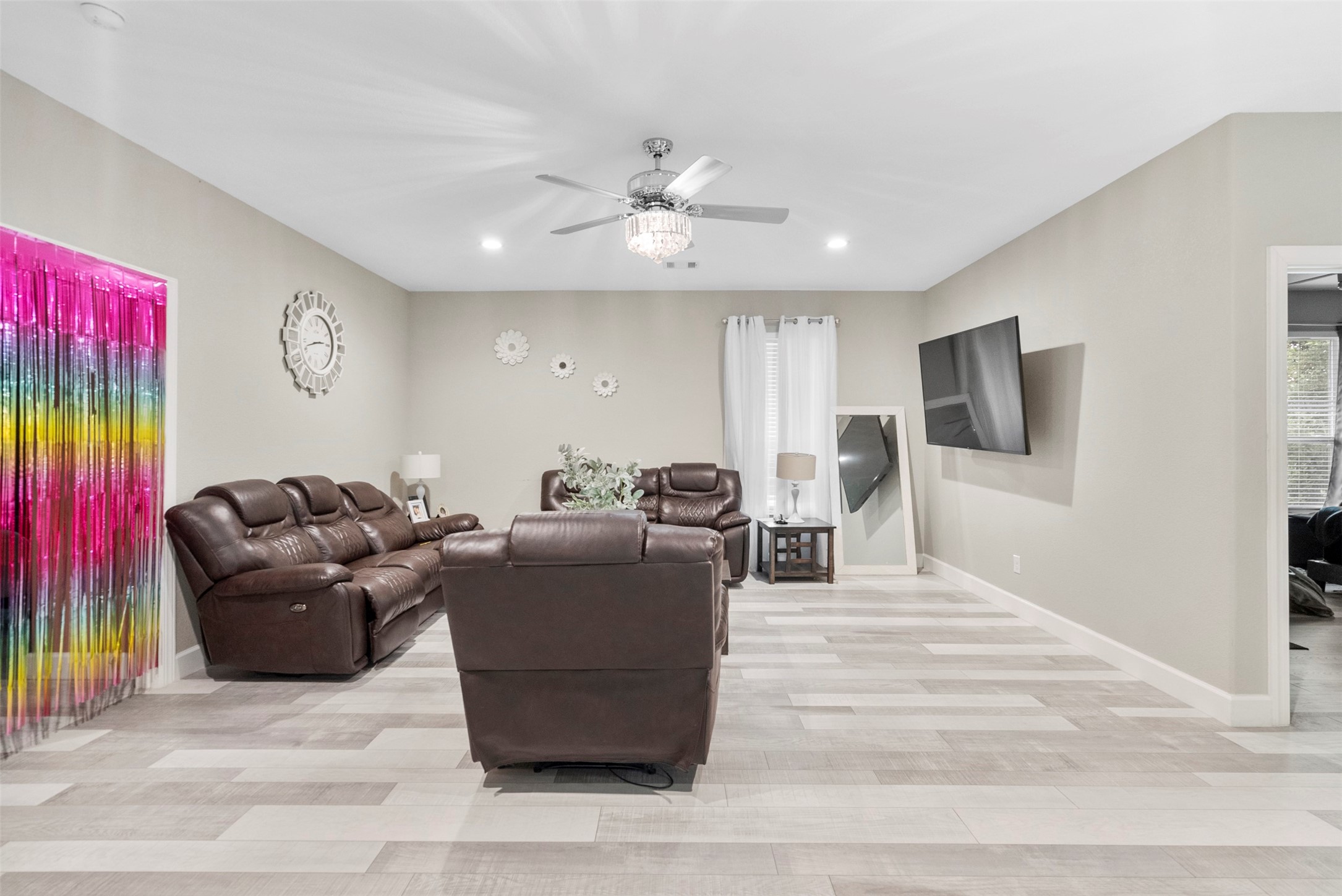 21502 Flint Trail Porter, TX 77365 - Photo 17 of 38 a living room with furniture and a flat screen tv