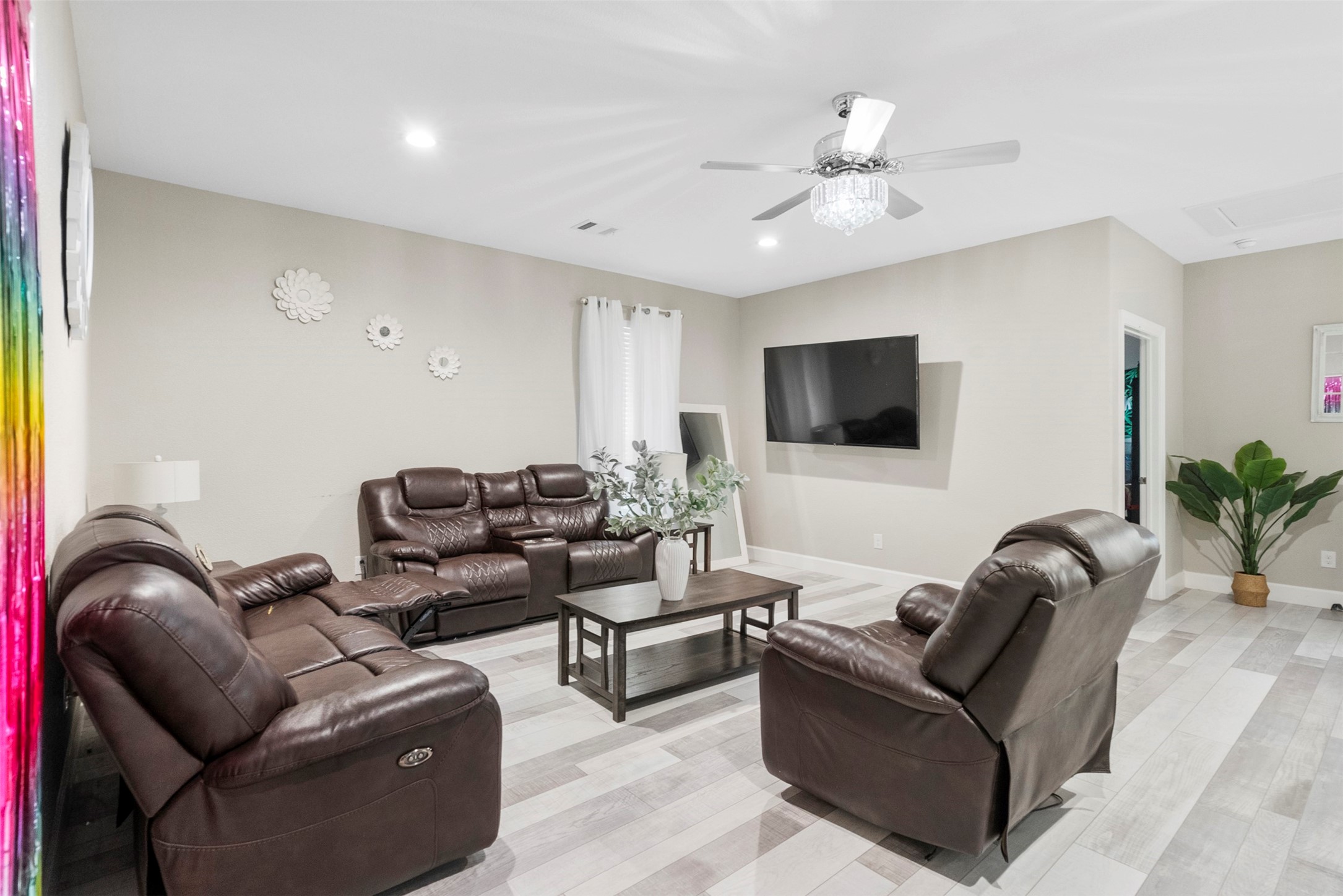 21502 Flint Trail Porter, TX 77365 - Photo 18 of 38 a living room with furniture and a flat screen tv
