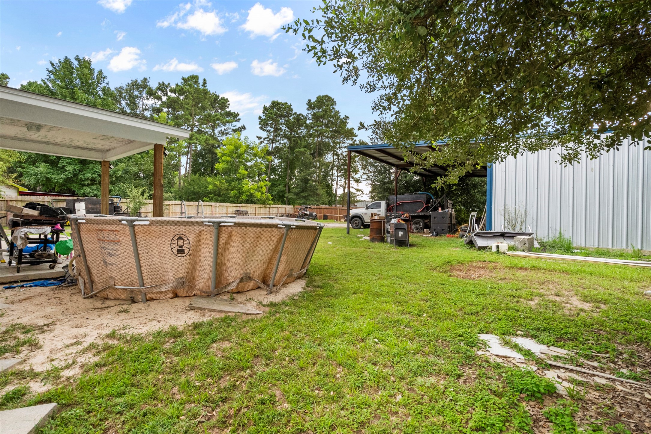 21502 Flint Trail Porter, TX 77365 - Photo 27 of 38 a view of a backyard with a tree
