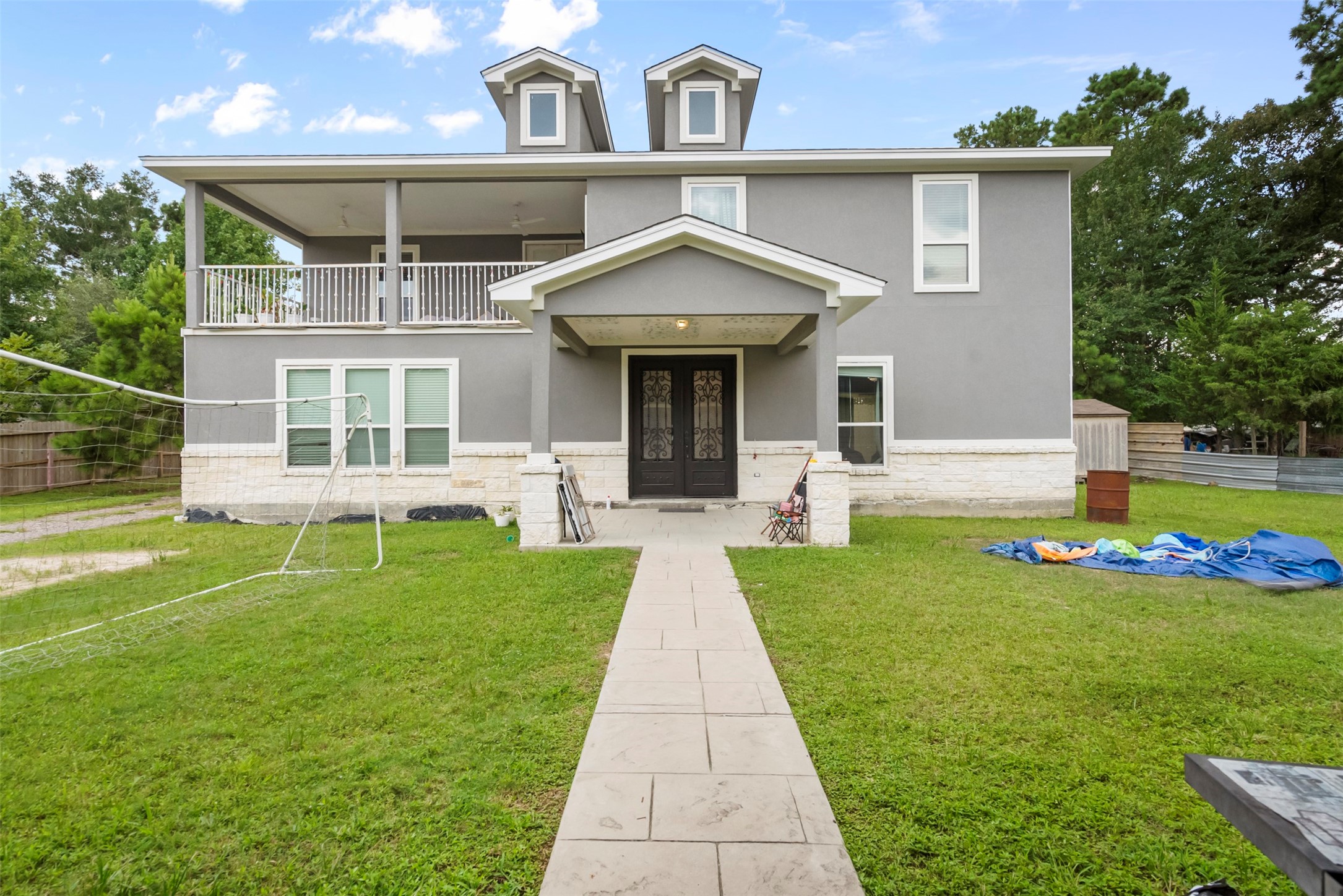 21502 Flint Trail Porter, TX 77365 - Photo 29 of 38 a front view of a house with garden