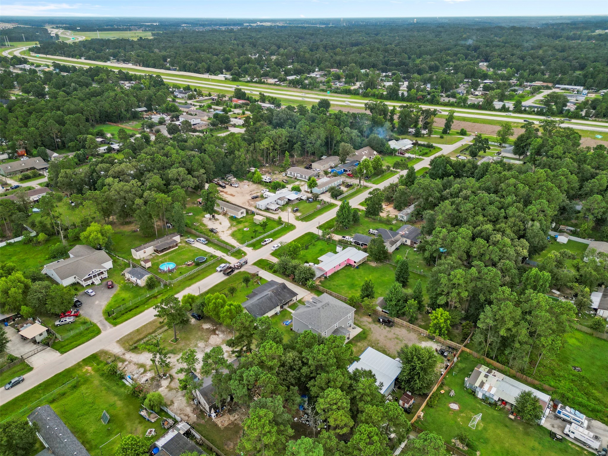 21502 Flint Trail Porter, TX 77365 - Photo 38 of 38 a view of a city with lush green forest