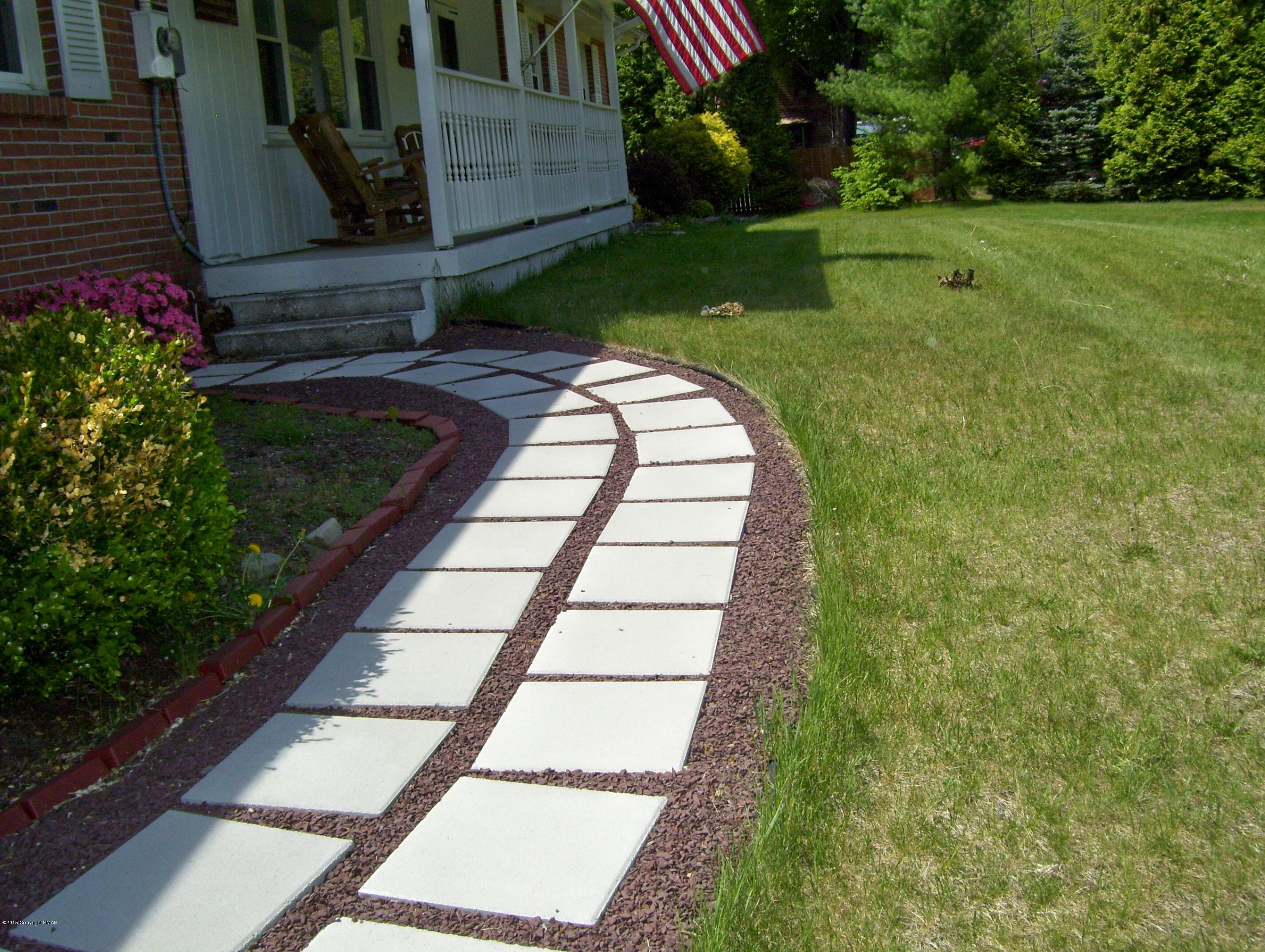2610 Brookdale Road Scotrun, PA 18355 - Photo 2 of 37 a view of a backyard with sitting area