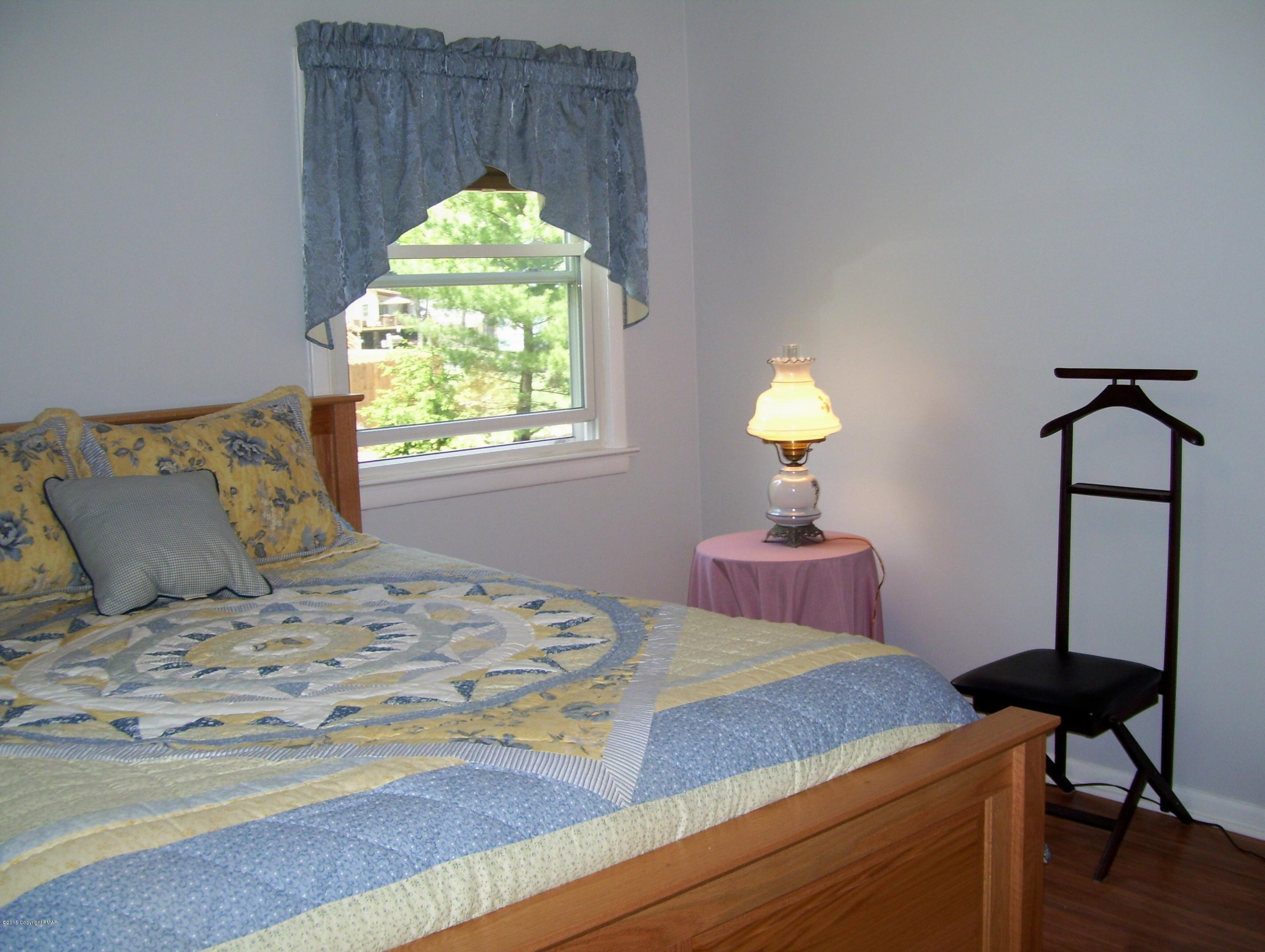2610 Brookdale Road Scotrun, PA 18355 - Photo 24 of 37 a bedroom with a bed and a window