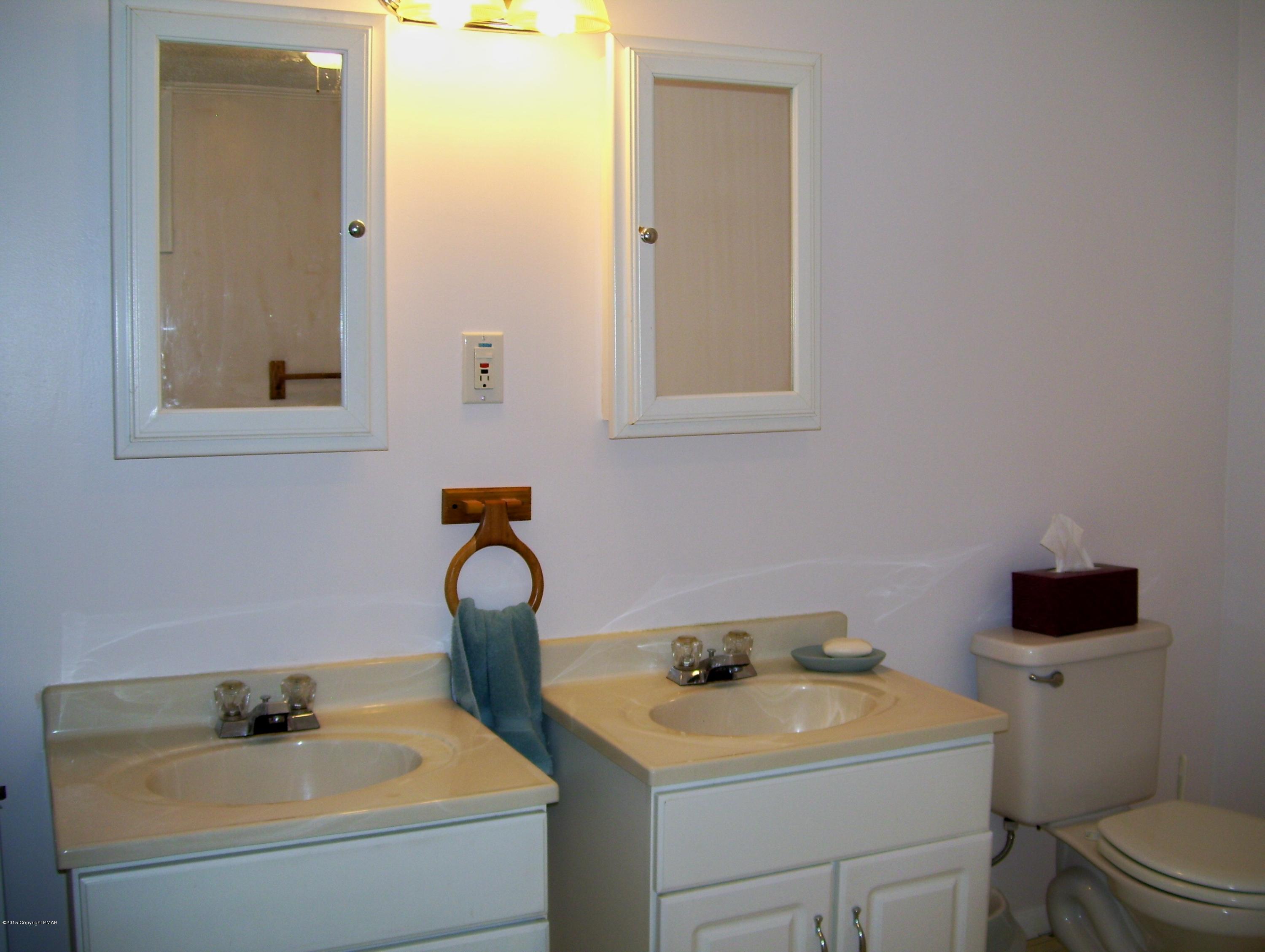 2610 Brookdale Road Scotrun, PA 18355 - Photo 27 of 37 a bathroom with a sink and a toilet