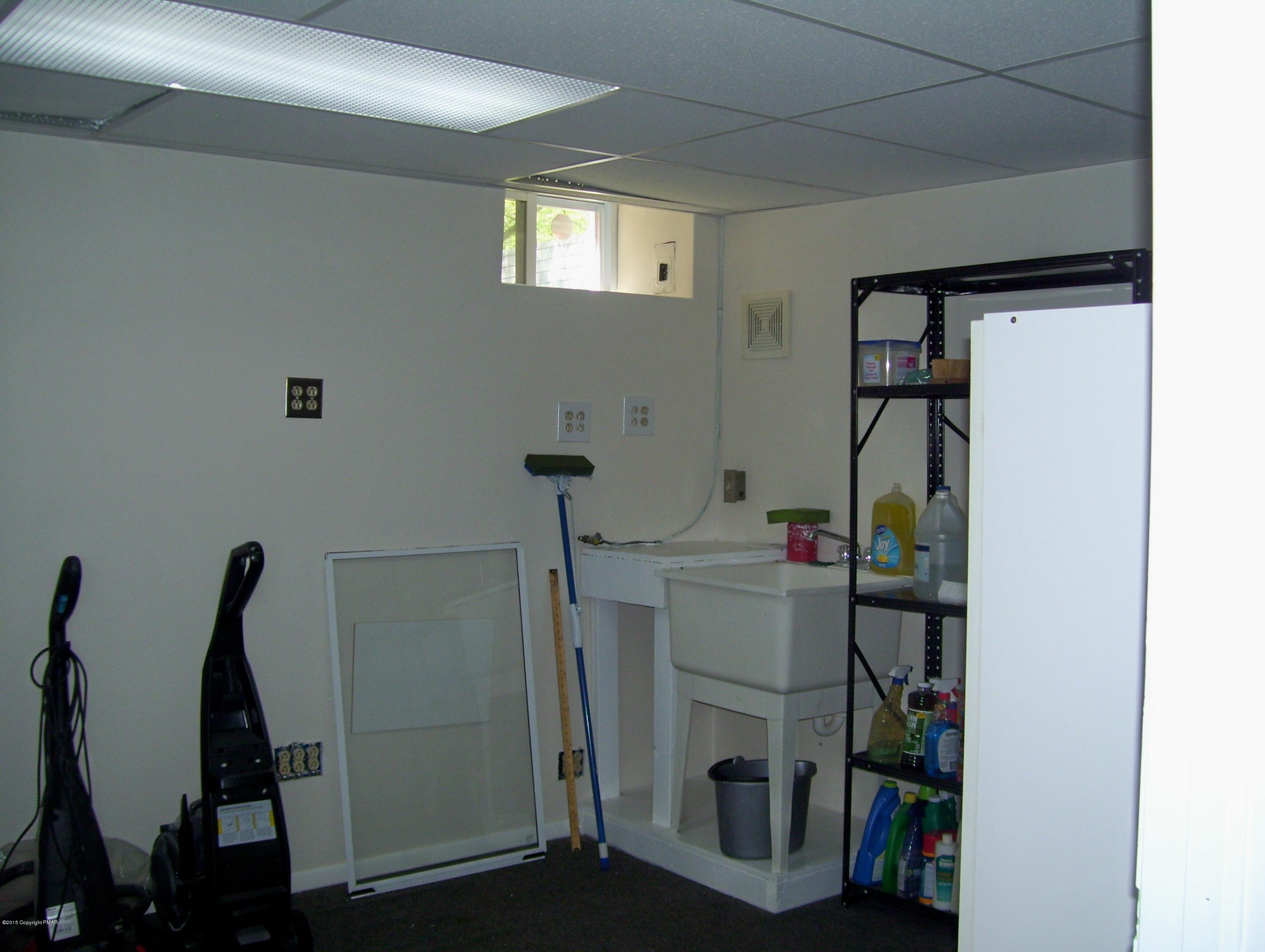 2610 Brookdale Road Scotrun, PA 18355 - Photo 34 of 37 a room with furniture and white walls