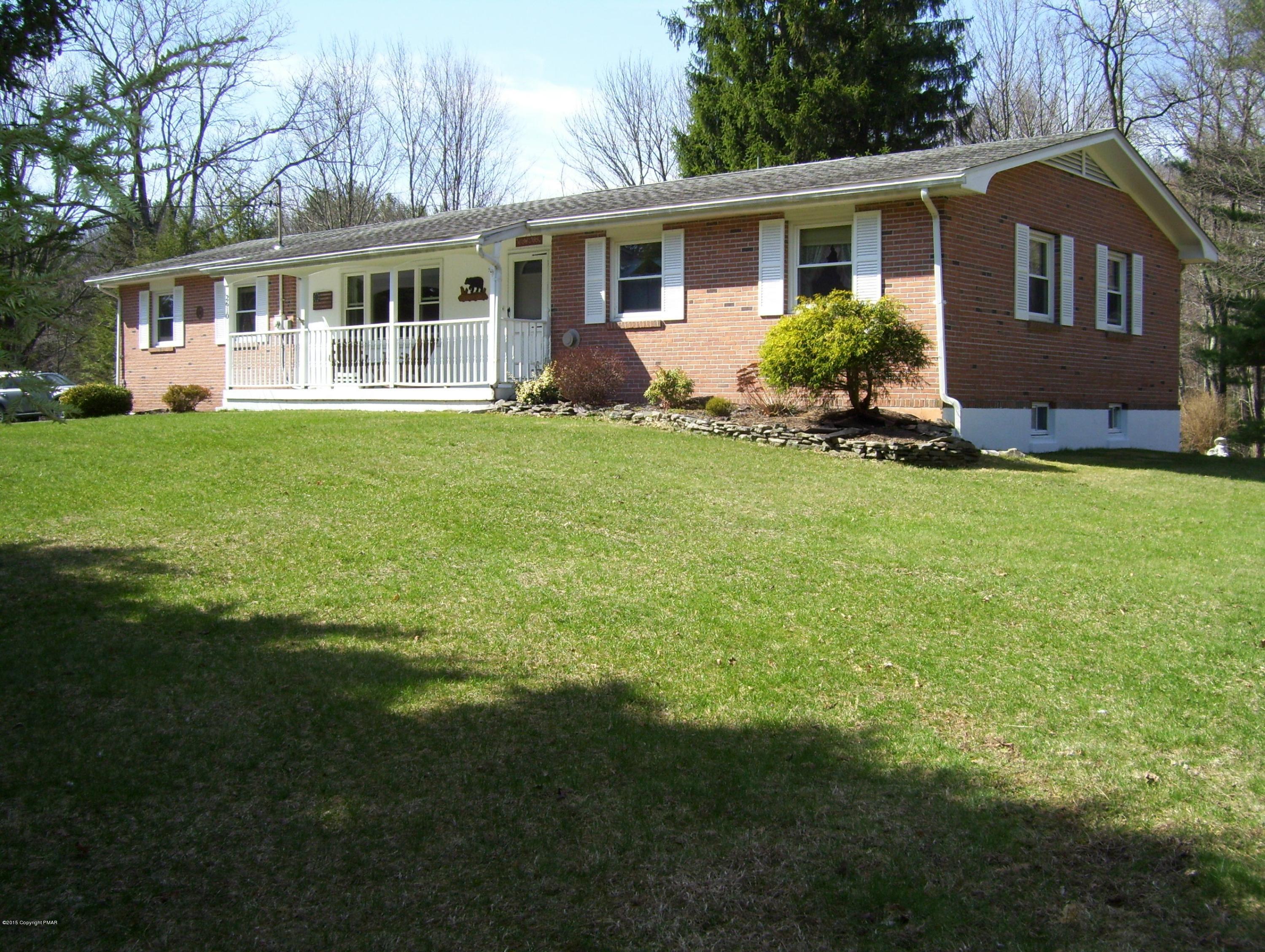 2610 Brookdale Road Scotrun, PA 18355 - Photo 4 of 37 a front view of house with yard and green space