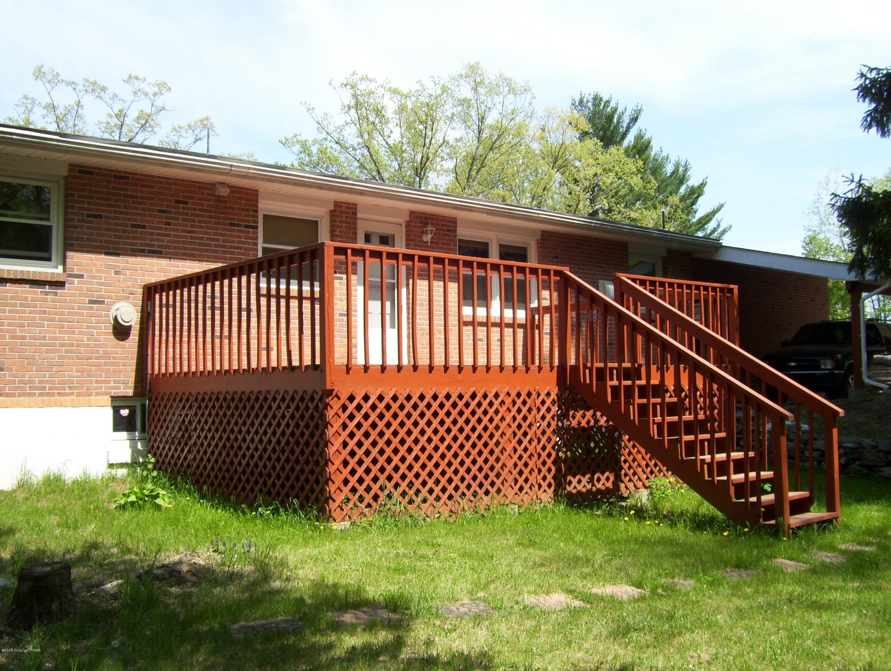 2610 Brookdale Road Scotrun, PA 18355 - Photo 5 of 37 a view of a deck with a yard