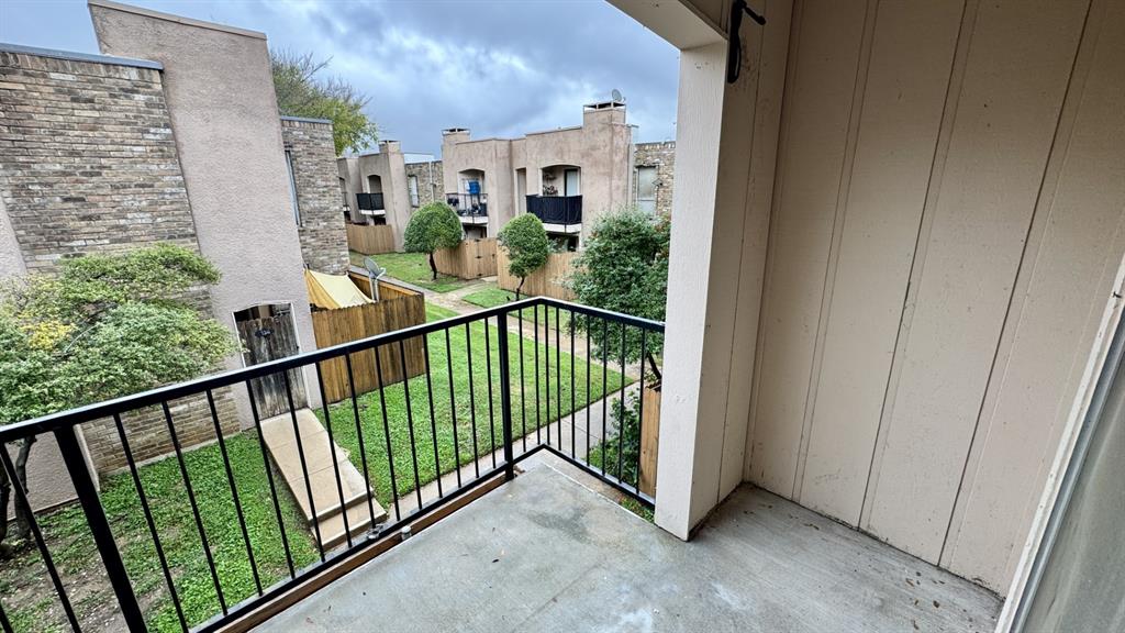 5616 Boca Raton Boulevard, Unit 238 Fort Worth, TX 76112 - Photo 11 of 11 a view of a balcony with wooden floor