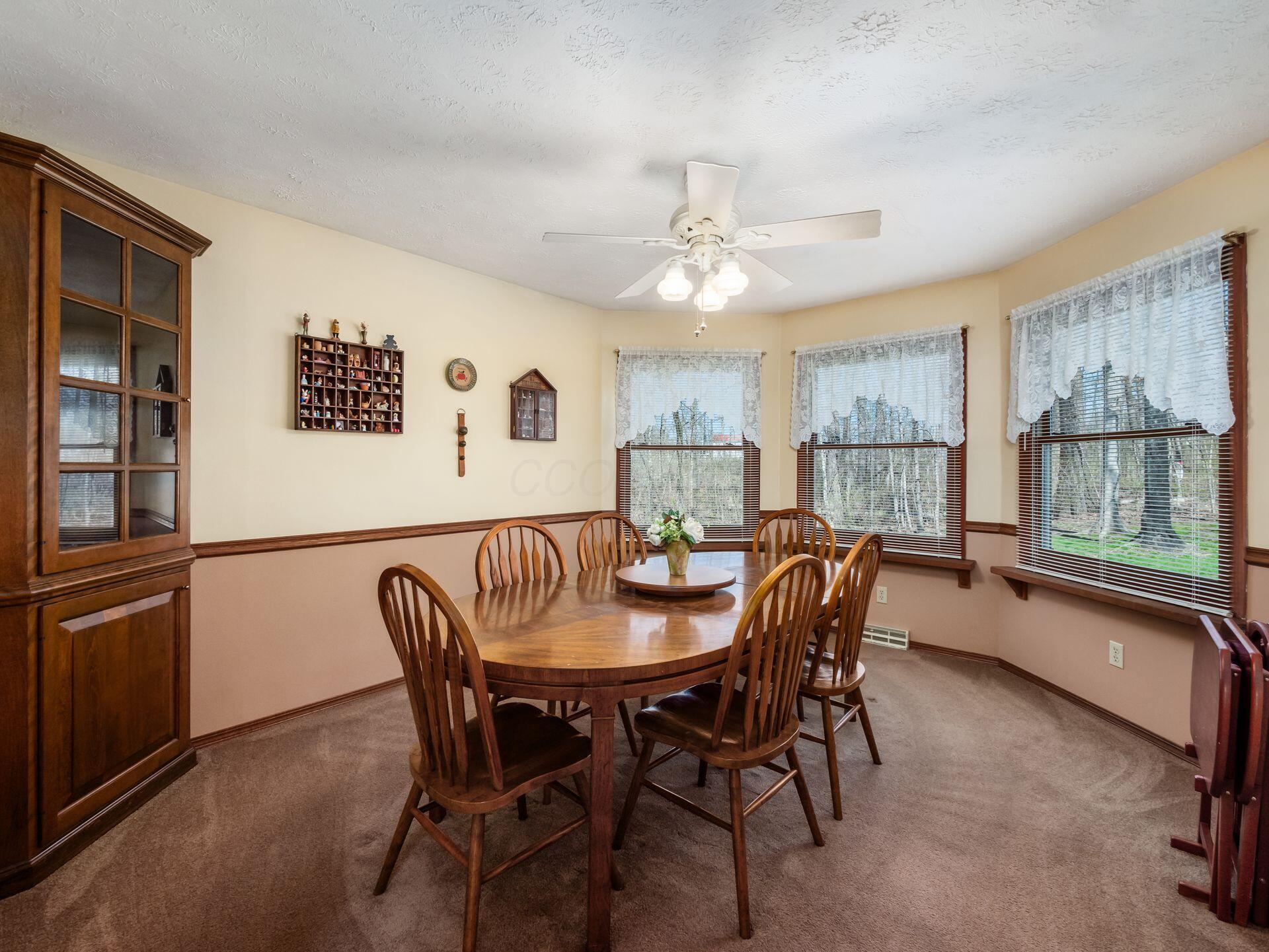 12741 Goodman Road Ashville, OH 43103 - Photo 10 of 61 This charming dining room overlooks the scenic, wooded back yard