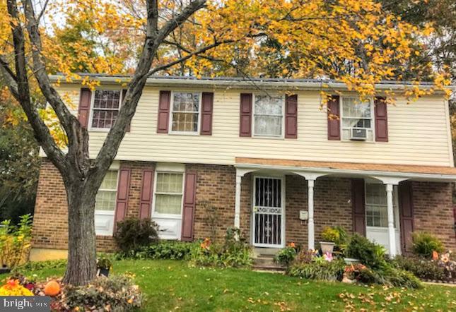 6802 Killarney Street Clinton, MD 20735 - Photo 1 of 19 front view of a house with a yard