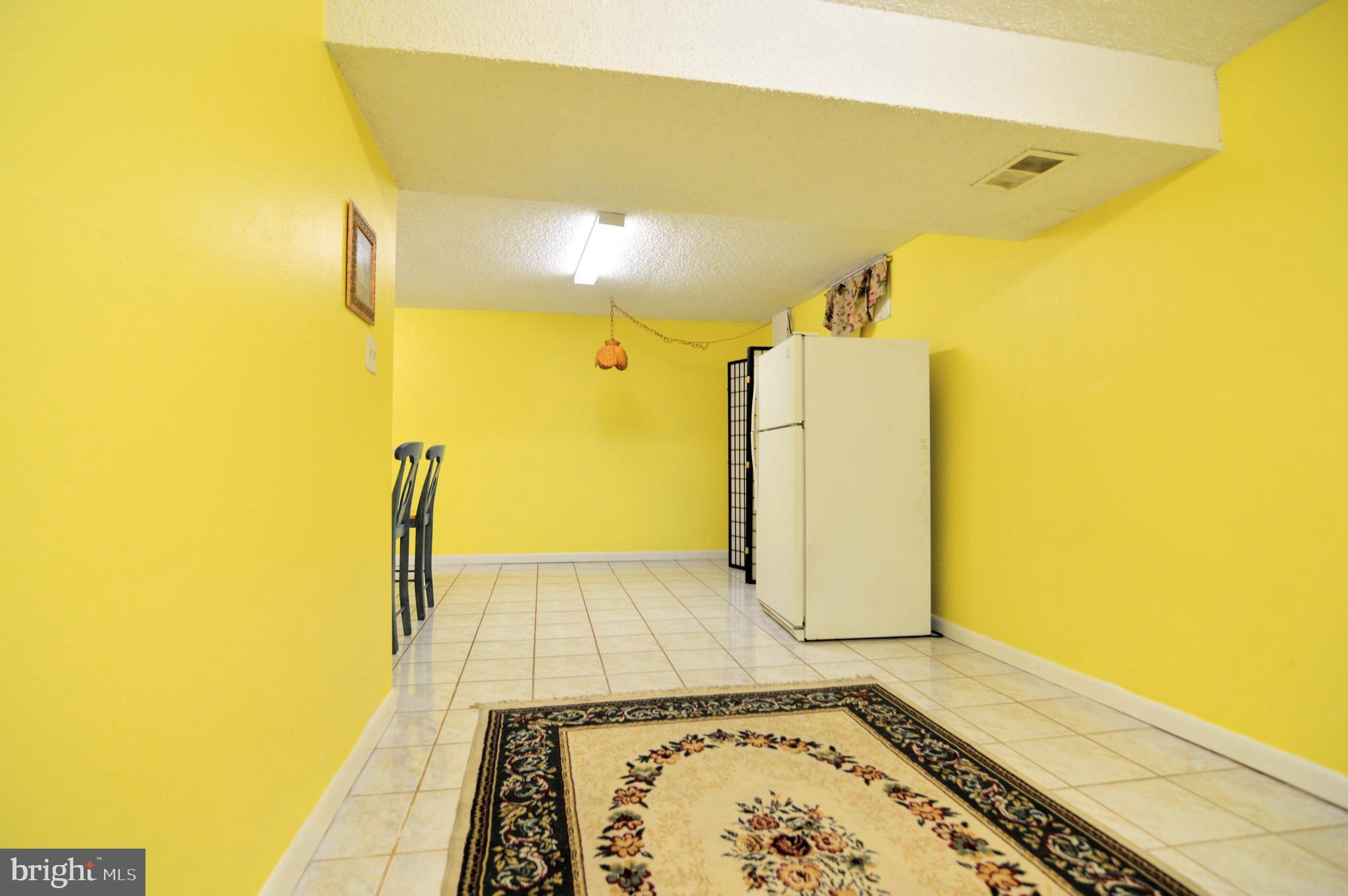 6802 Killarney Street Clinton, MD 20735 - Photo 3 of 19 a view of a bathroom with a sink