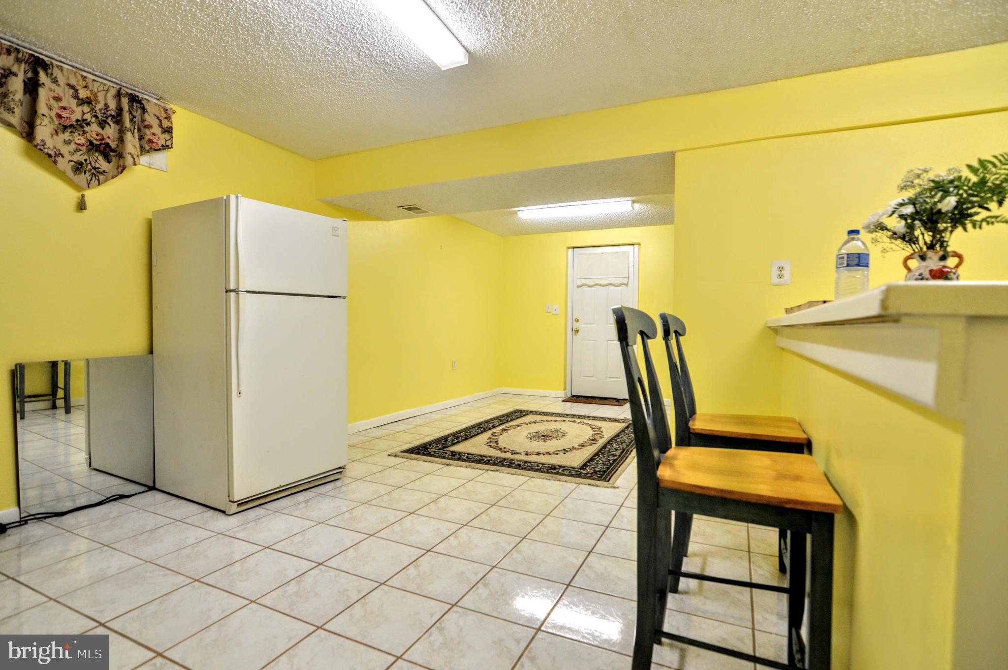 6802 Killarney Street Clinton, MD 20735 - Photo 8 of 19 a view of a bathroom with mirror