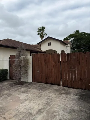 a view of a house with a garage