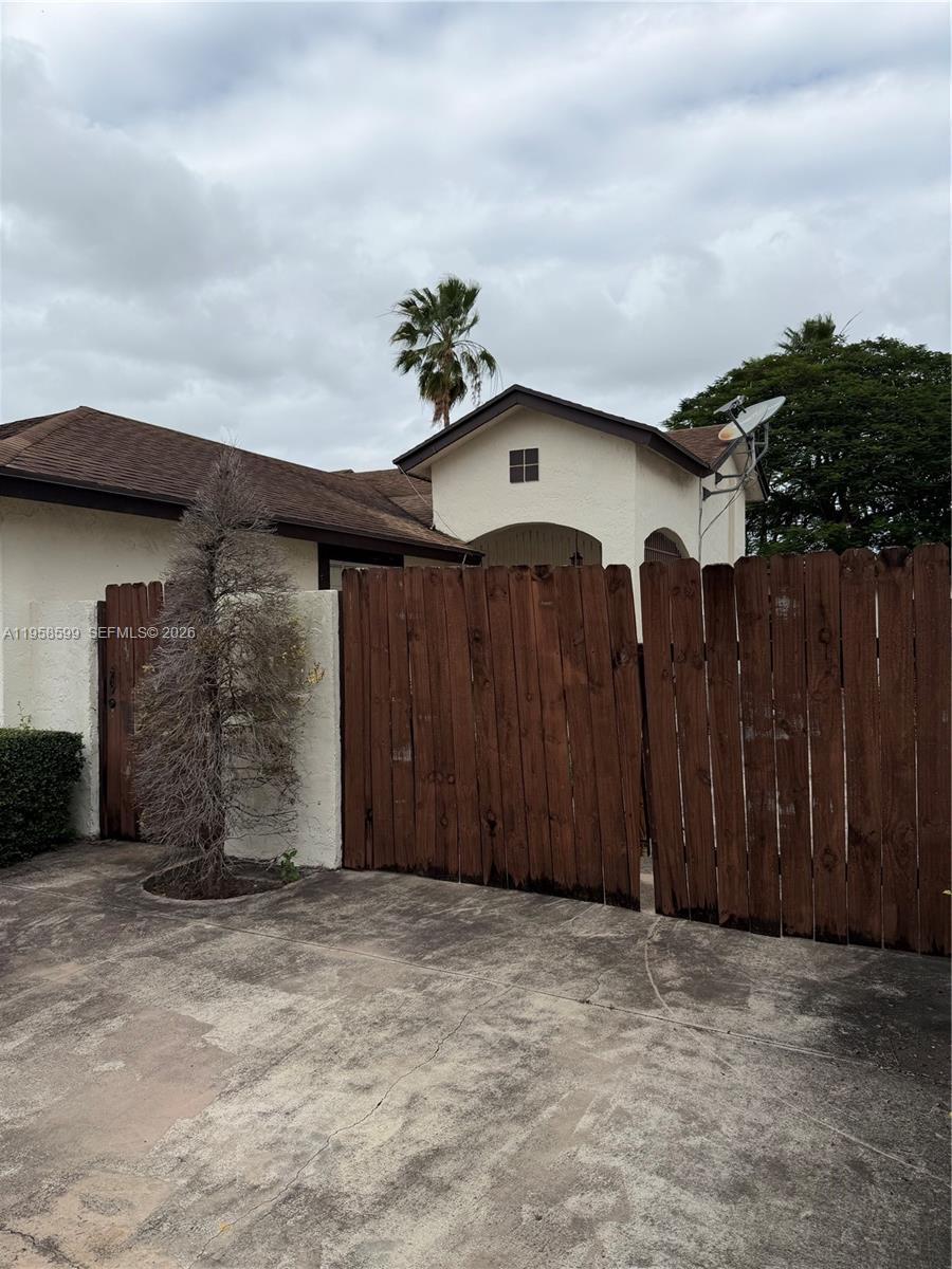 14249 Southwest 103rd Terrace Miami, FL 33186 - Photo 3 of 14 a view of a house with a garage
