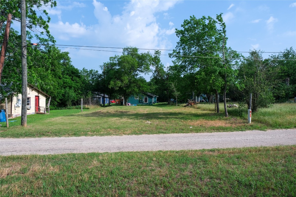 602 Alley A Street Elgin, TX 78621 - Photo 6 of 7 a view of a park with large trees