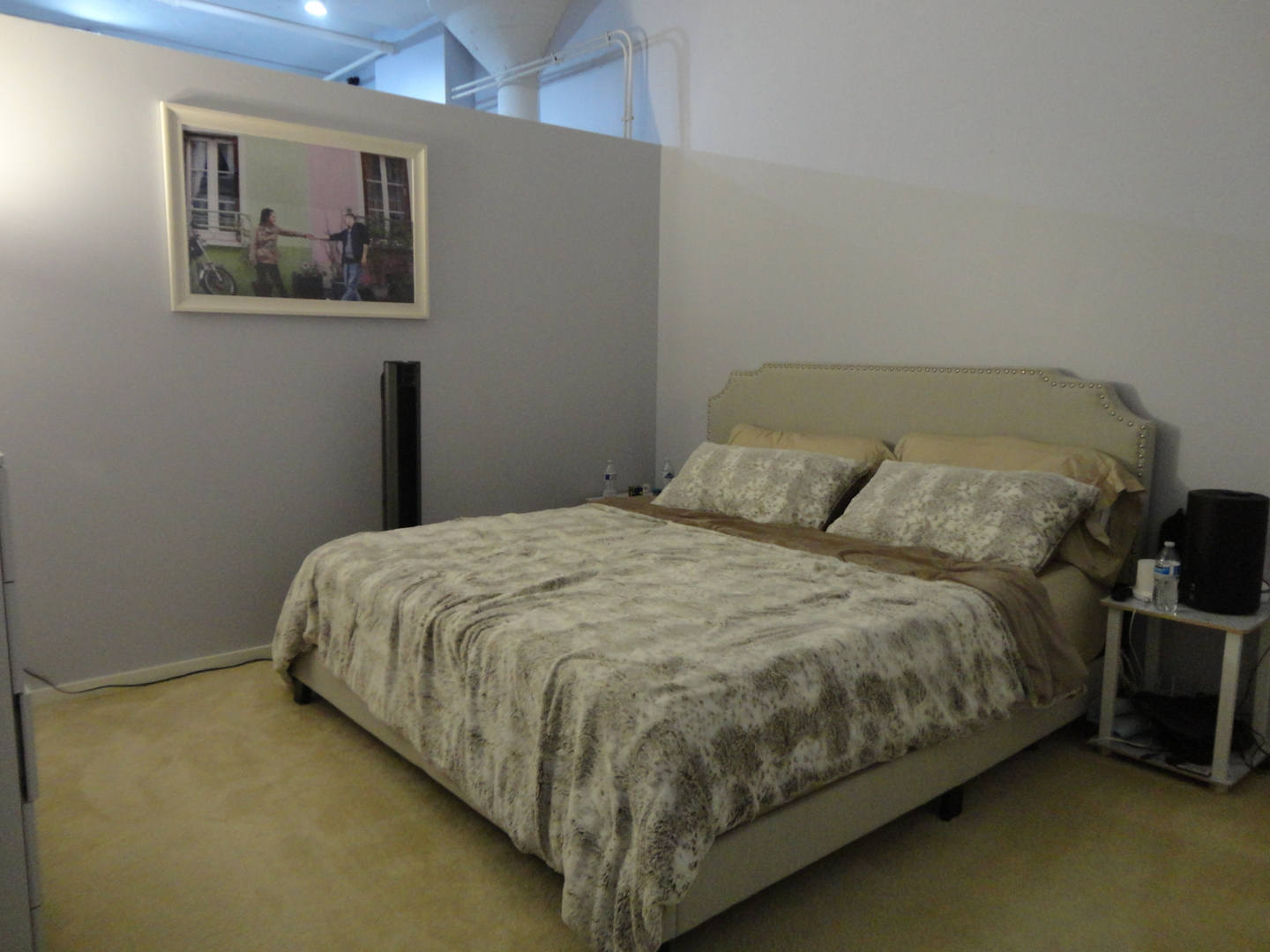 2323 West Pershing Road, Unit 237 Chicago, IL 60609 - Photo 15 of 22 a bed sitting in a bedroom next to a small yard