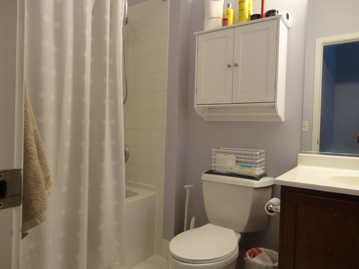 2323 West Pershing Road, Unit 237 Chicago, IL 60609 - Photo 20 of 22 a white toilet sitting next to a bathroom sink