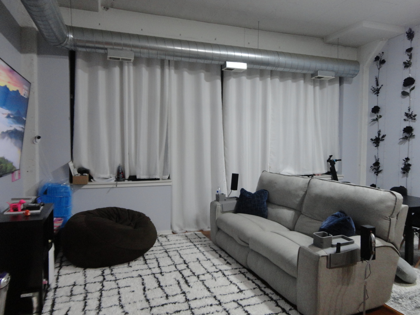 2323 West Pershing Road, Unit 237 Chicago, IL 60609 - Photo 5 of 22 a living room with furniture and a fireplace
