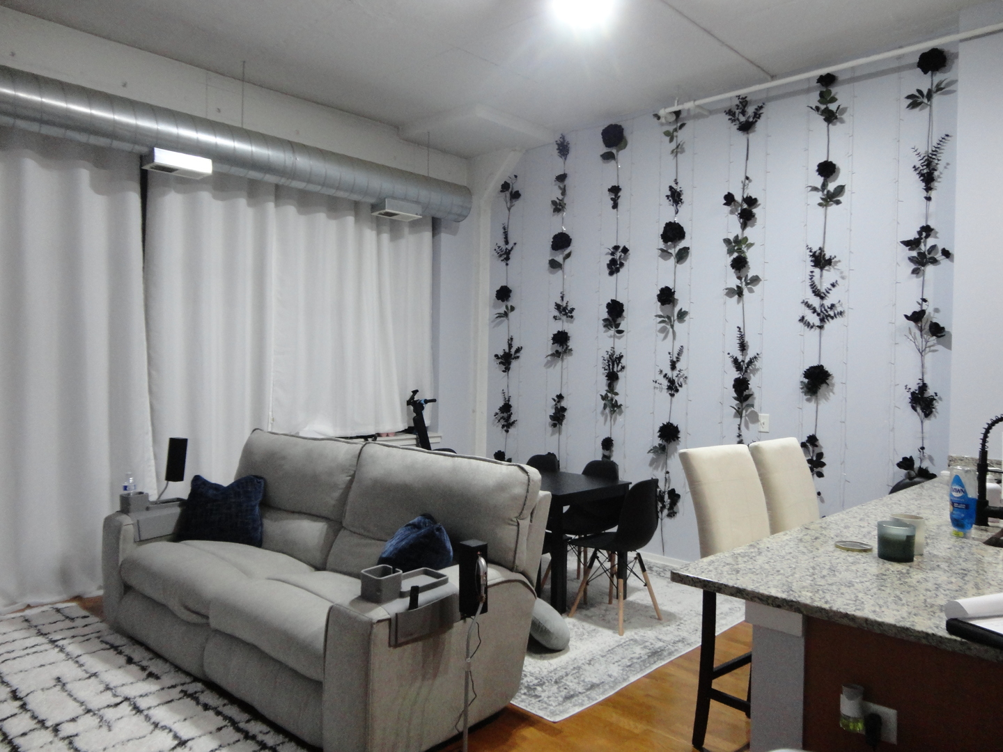 2323 West Pershing Road, Unit 237 Chicago, IL 60609 - Photo 6 of 22 a living room with furniture and a rug