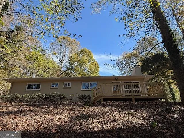 a view of a house with a garden