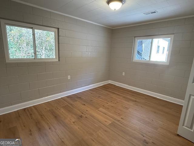 206 Sycamore Way Clarkesville, GA 30523 - Photo 14 of 19 a view of empty room with wooden floor and fan