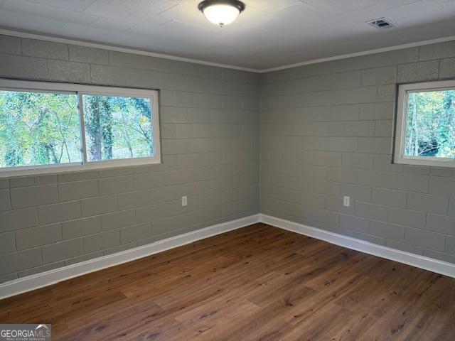 206 Sycamore Way Clarkesville, GA 30523 - Photo 10 of 19 wooden floor in an empty room with a window