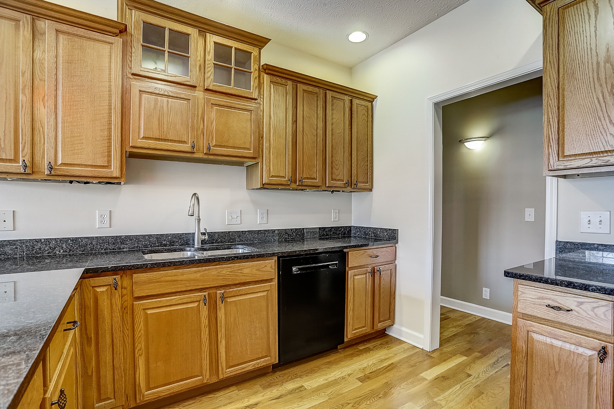 3947 Rowland Road Murfreesboro, TN 37128 - Photo 12 of 50 a kitchen with stainless steel appliances granite countertop a stove a sink and a granite counter tops