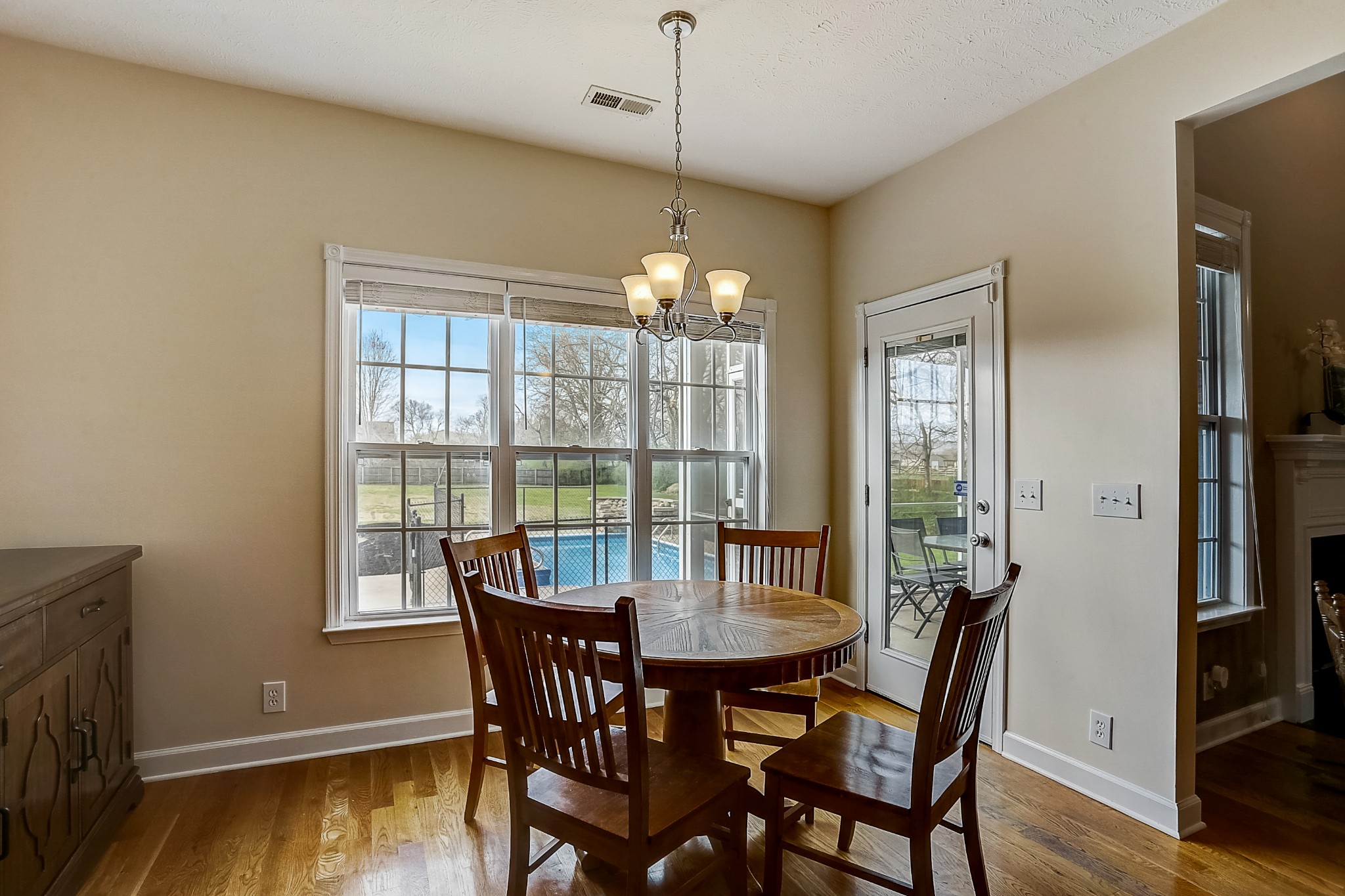 3947 Rowland Road Murfreesboro, TN 37128 - Photo 13 of 50 a view of a dining room with furniture window and wooden floor