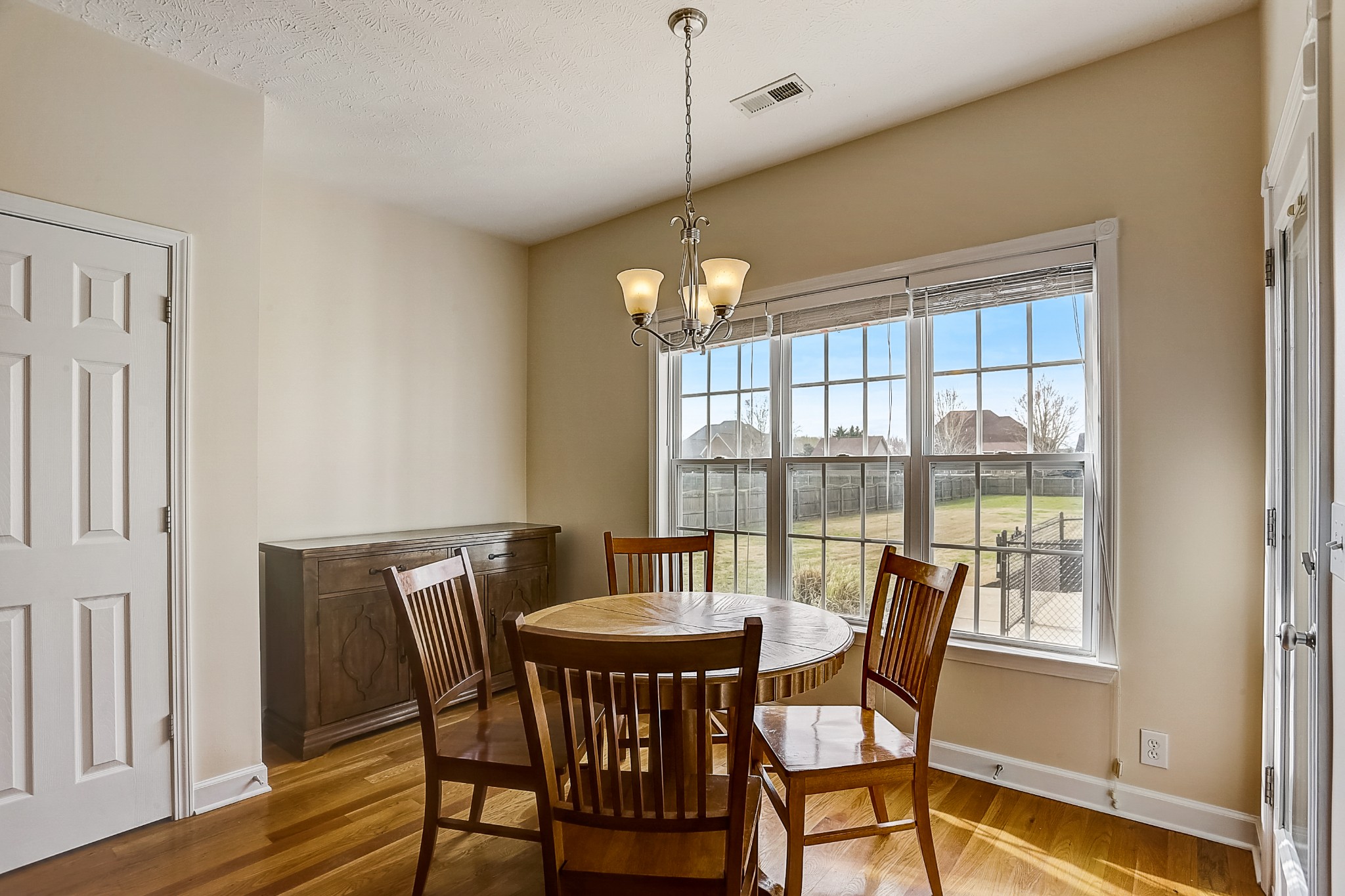 3947 Rowland Road Murfreesboro, TN 37128 - Photo 14 of 50 a view of a dining room with furniture window and wooden floor