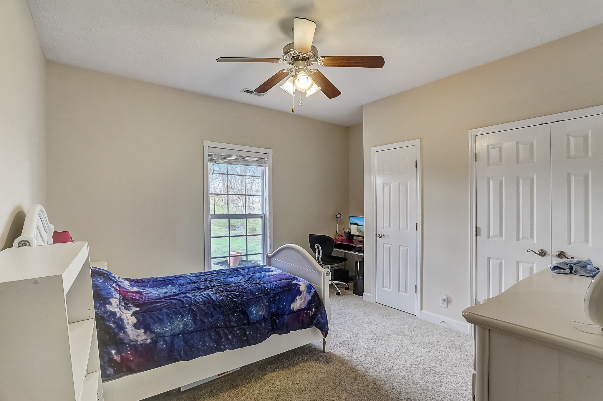 3947 Rowland Road Murfreesboro, TN 37128 - Photo 15 of 50 a spacious bedroom with a bed and a chandelier