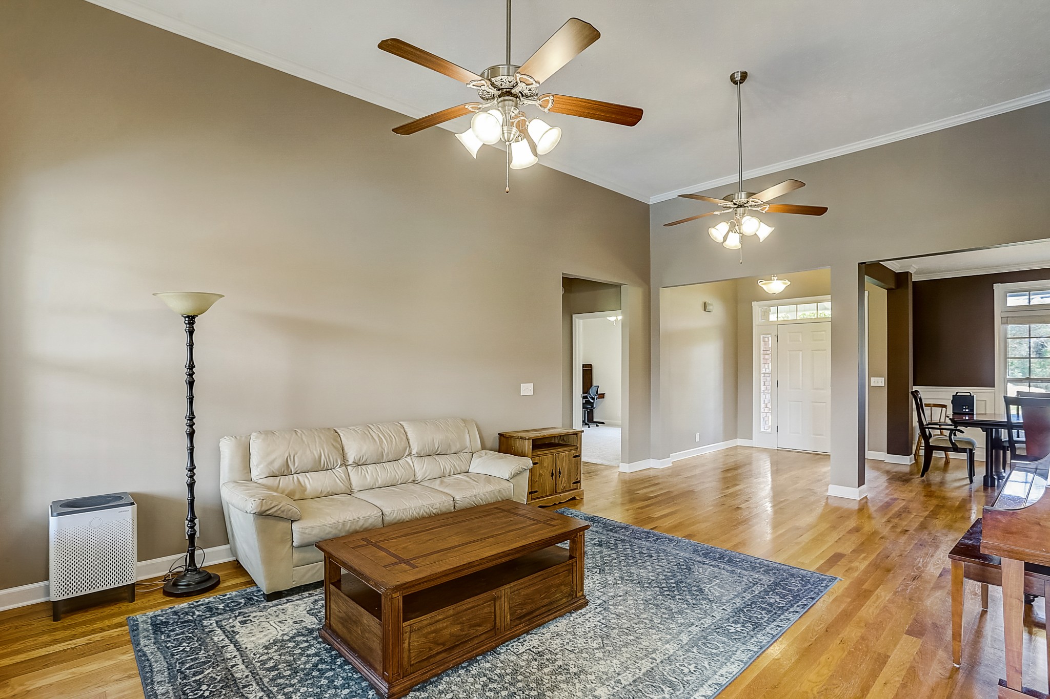 3947 Rowland Road Murfreesboro, TN 37128 - Photo 3 of 50 a living room with furniture and a chandelier