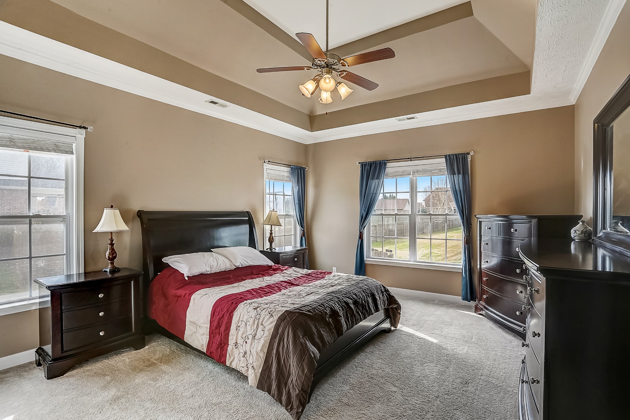 3947 Rowland Road Murfreesboro, TN 37128 - Photo 22 of 50 a bedroom with a large bed and a flat tv screen on dresser