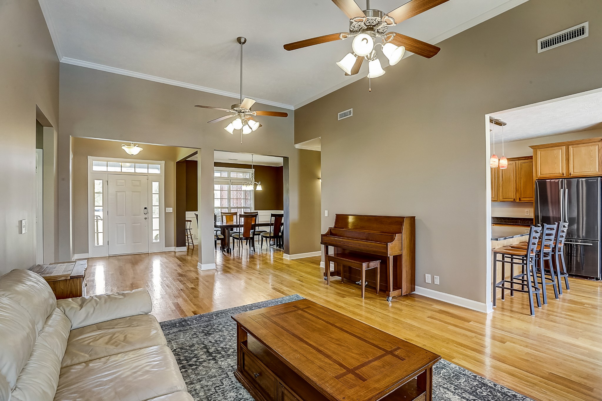 3947 Rowland Road Murfreesboro, TN 37128 - Photo 4 of 50 a living room with furniture a dining table and a piano