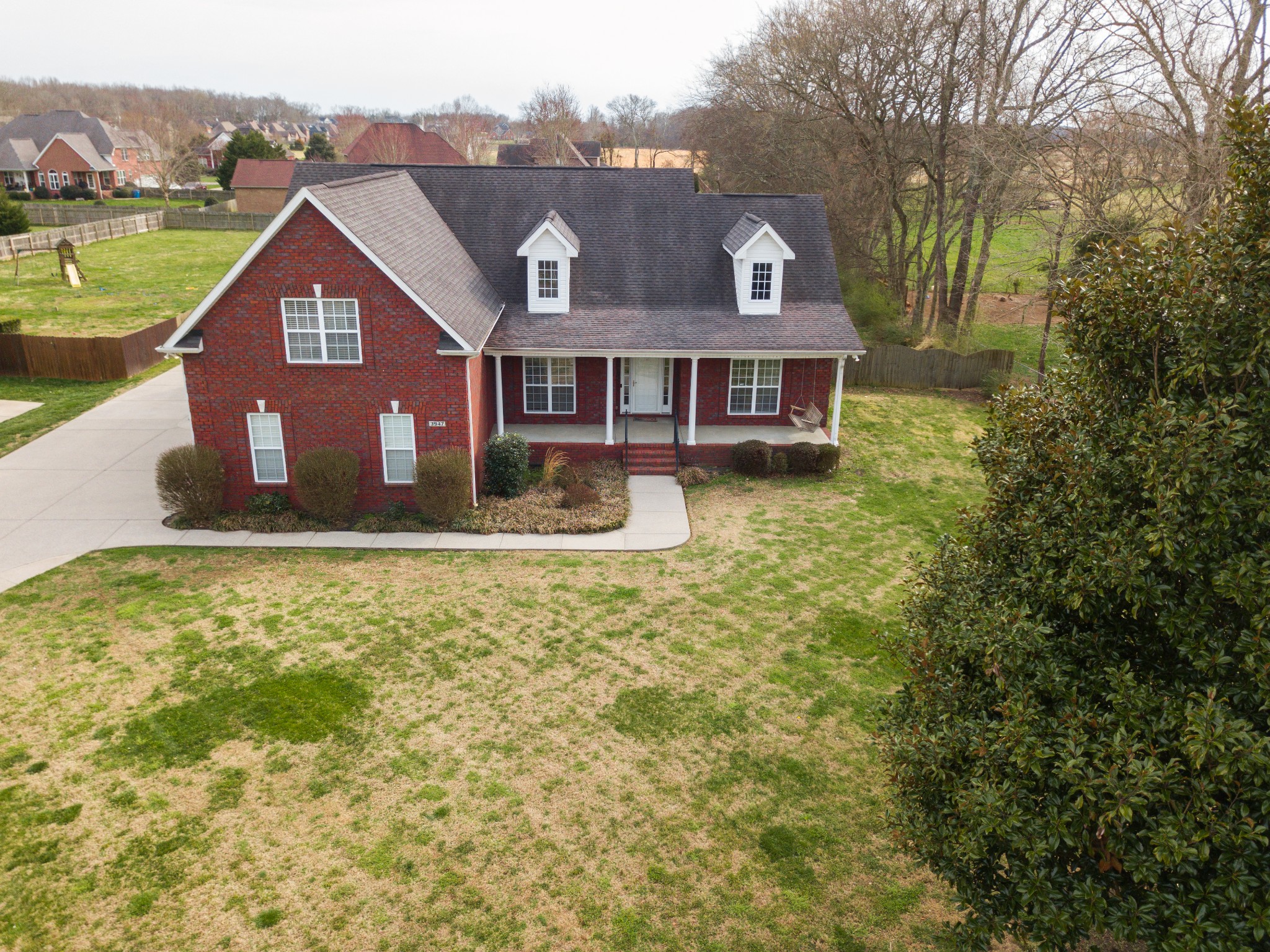 3947 Rowland Road Murfreesboro, TN 37128 - Photo 43 of 50 a front view of a house with garden