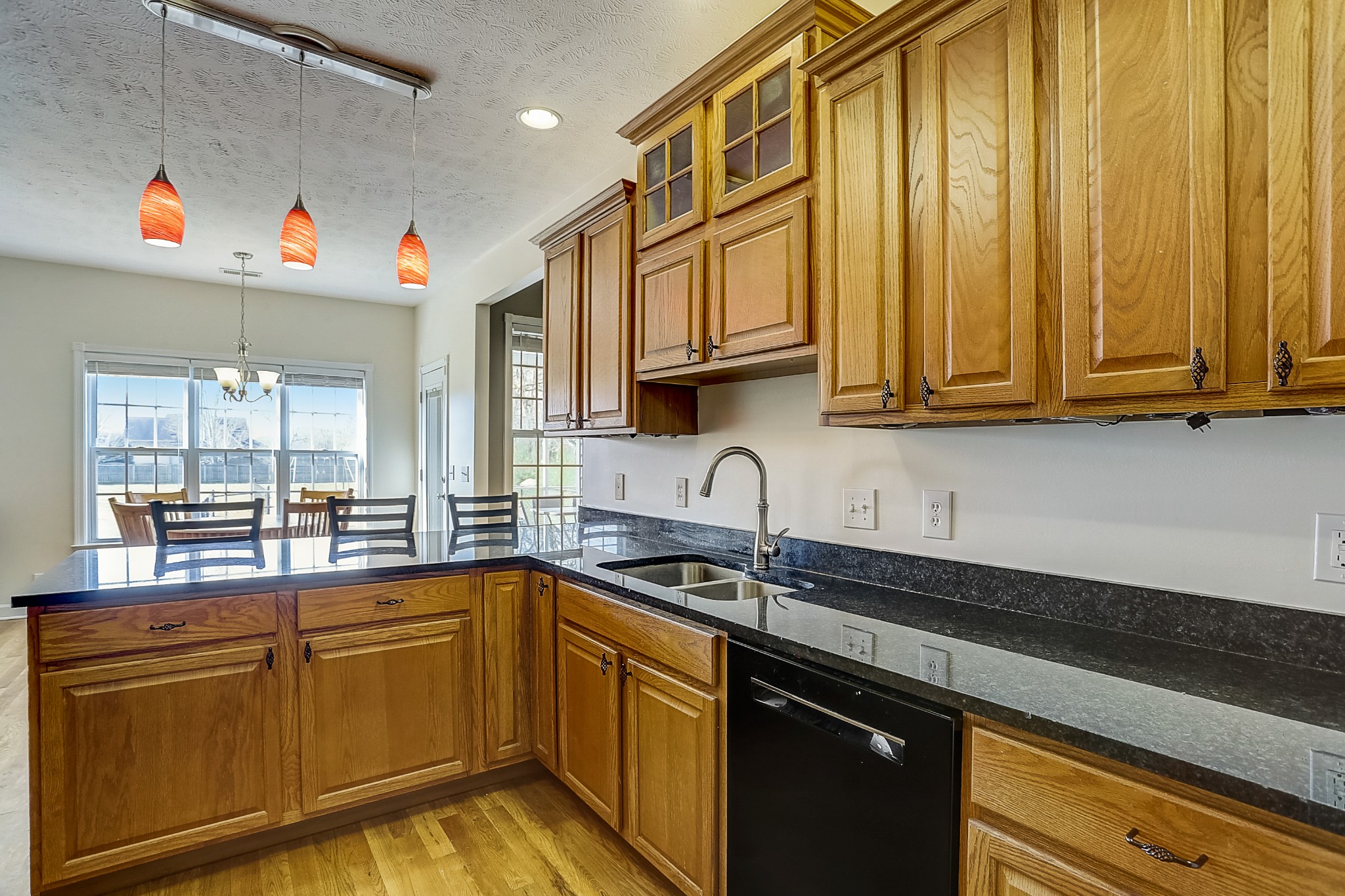3947 Rowland Road Murfreesboro, TN 37128 - Photo 8 of 50 a kitchen with stainless steel appliances granite countertop a sink a stove and cabinets
