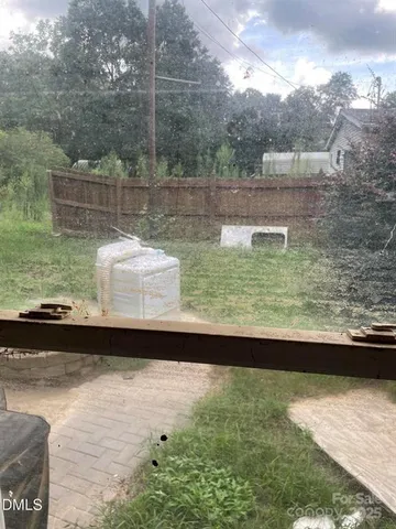 a view of swimming pool from a yard