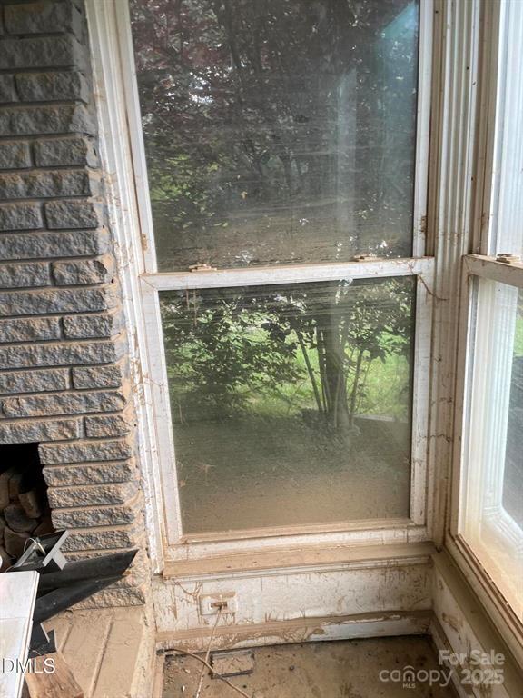1124 Riverside Drive Charlotte, NC 28214 - Photo 13 of 15 a bathroom with a glass door and a window