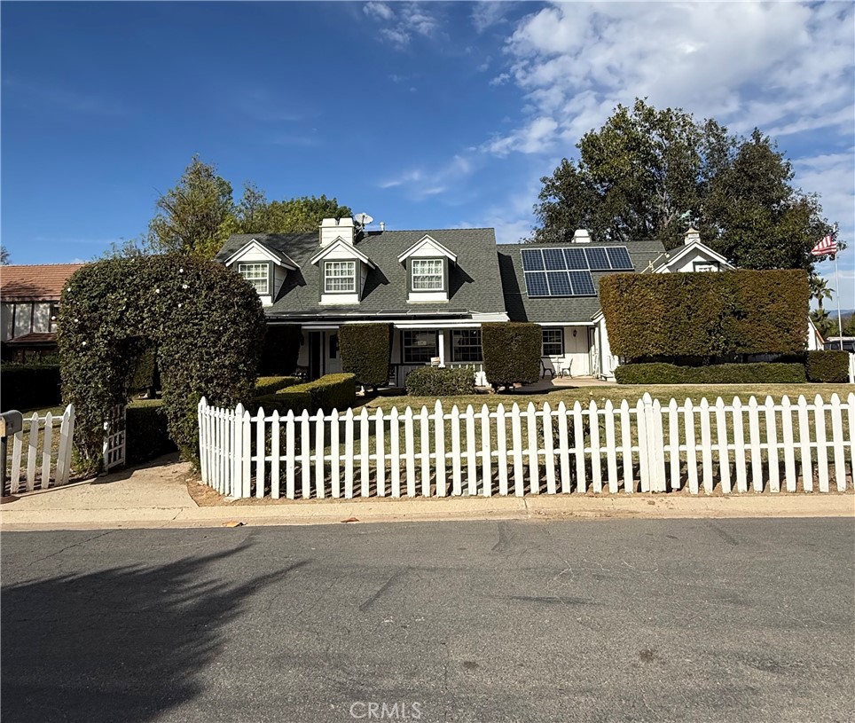 17438 Sunset View Drive Riverside, CA 92504 - Photo 1 of 1 a front view of a house with a yard