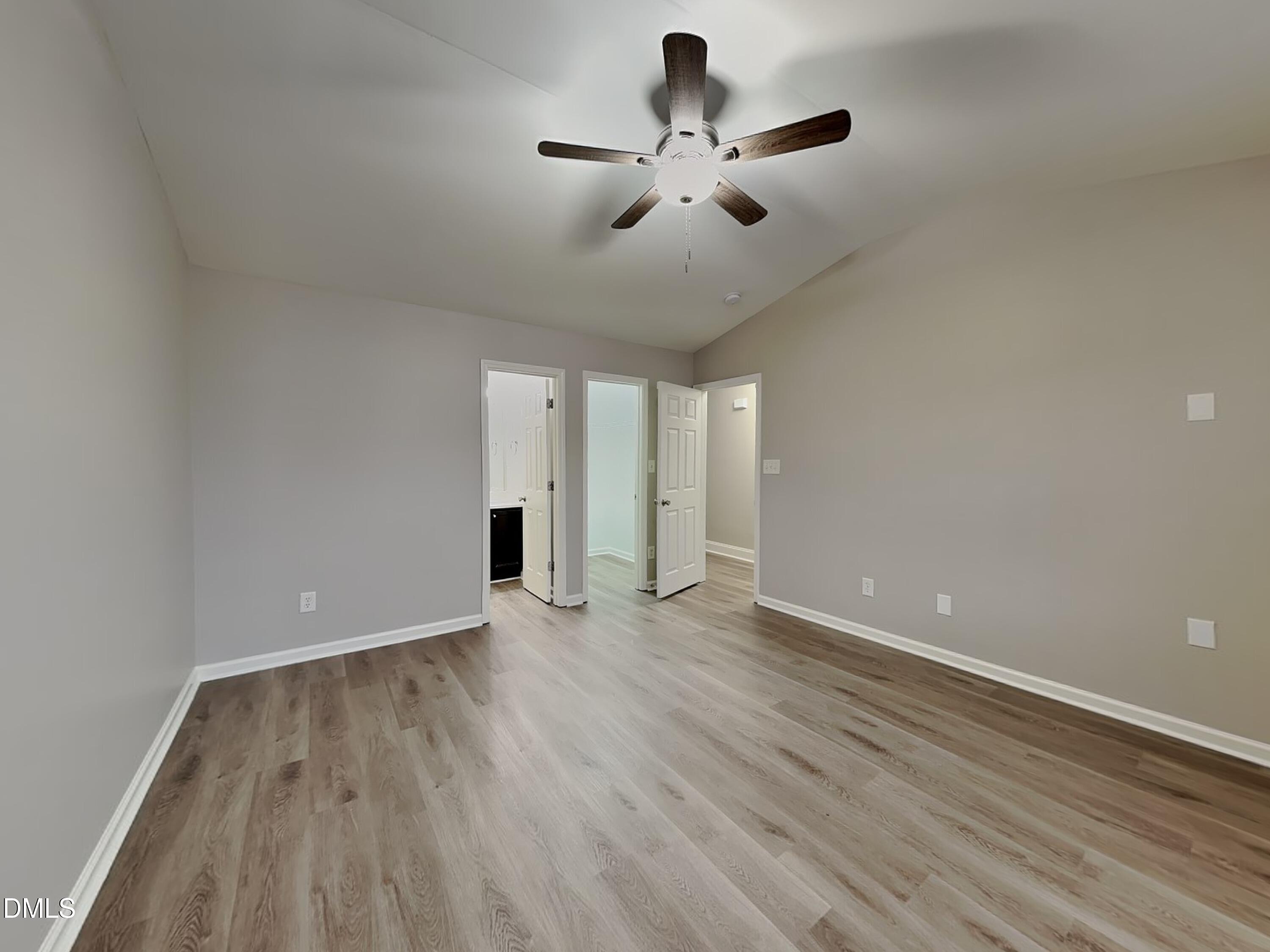 3665 Watkins Ridge Court Raleigh, NC 27616 - Photo 6 of 15 a view of an empty room with wooden floor