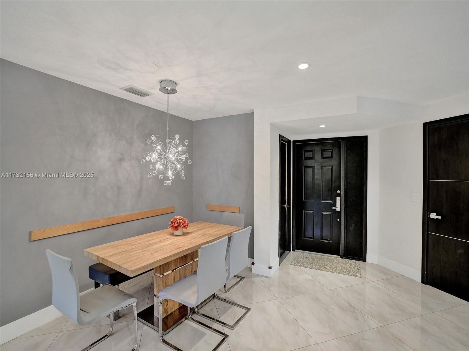 3507 Green Leaf Circle, Unit 2004 Hollywood, FL 33021 - Photo 16 of 33 a workspace with furniture and window in a room