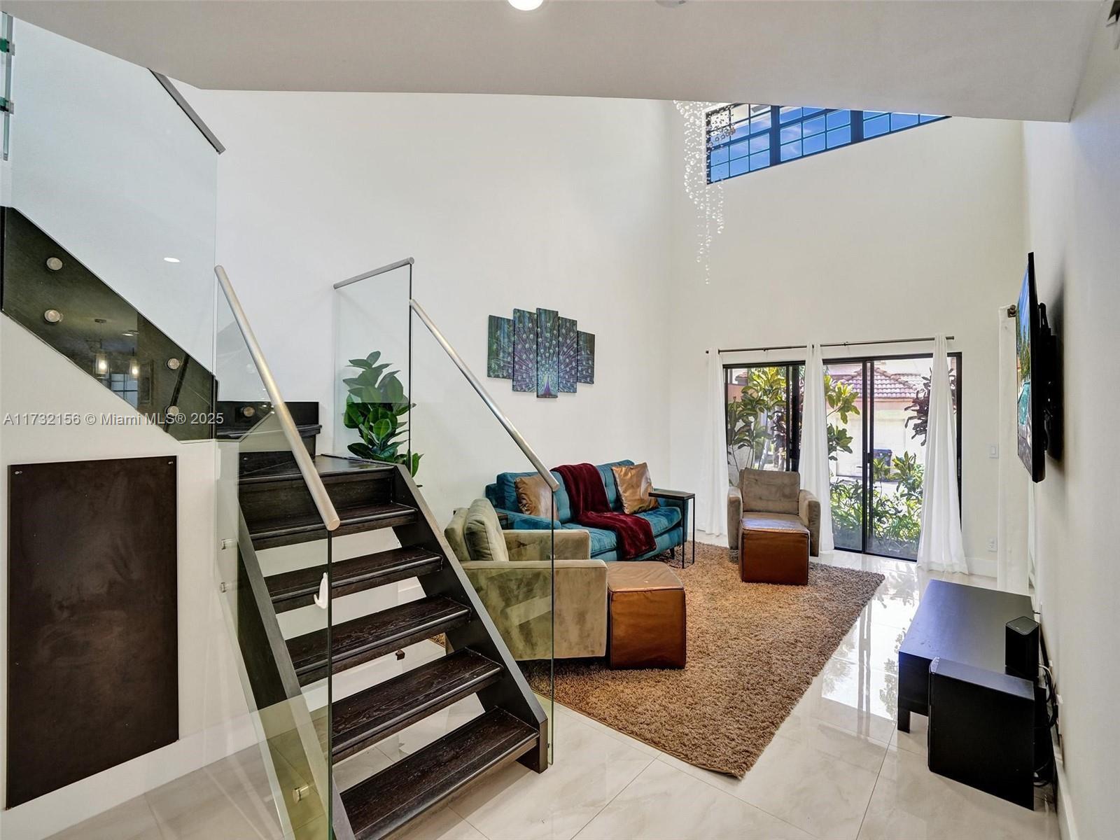3507 Green Leaf Circle, Unit 2004 Hollywood, FL 33021 - Photo 3 of 33 a living room with furniture and wooden floor