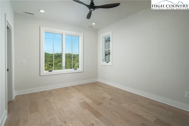 an empty room with windows