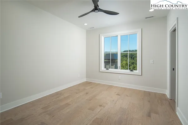 an empty room with windows