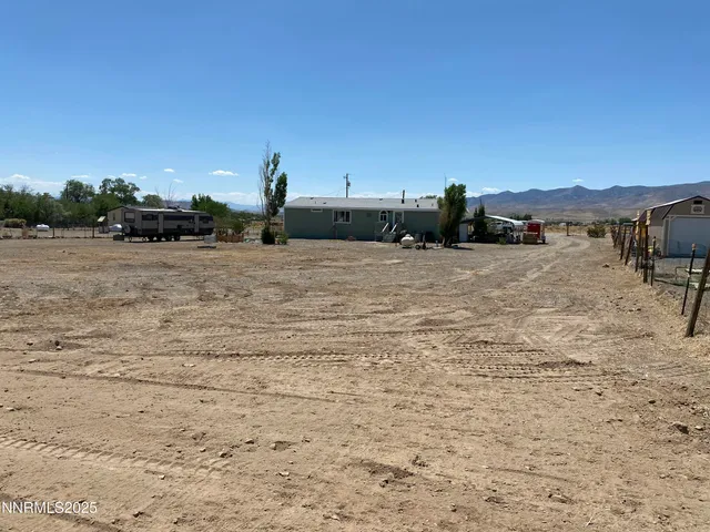 a view of a house with a patio